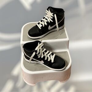 Black Nike high tops basketball shoes